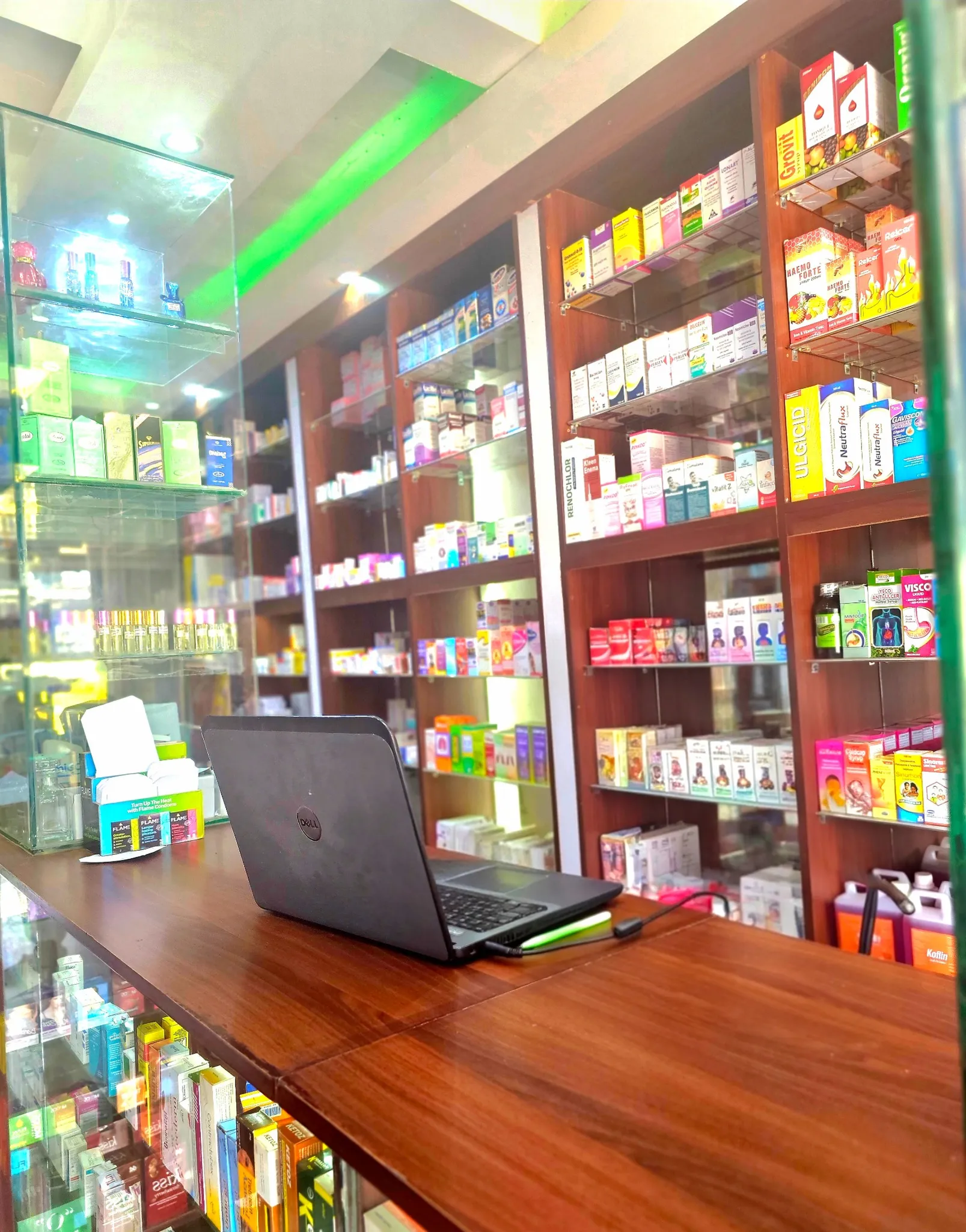 Kalidad Pharmacy Kisenyi Branch counter and shelves
